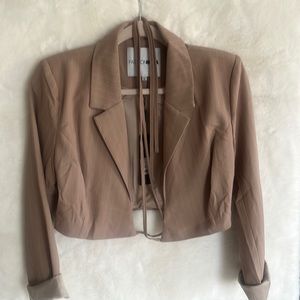 Tan and white striped spring time cropped rock around the abdomen jacket